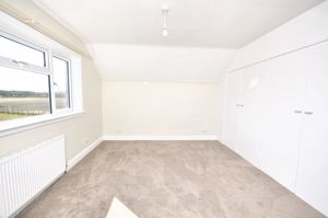 Bedroom two with fitted wardrobes- click for photo gallery